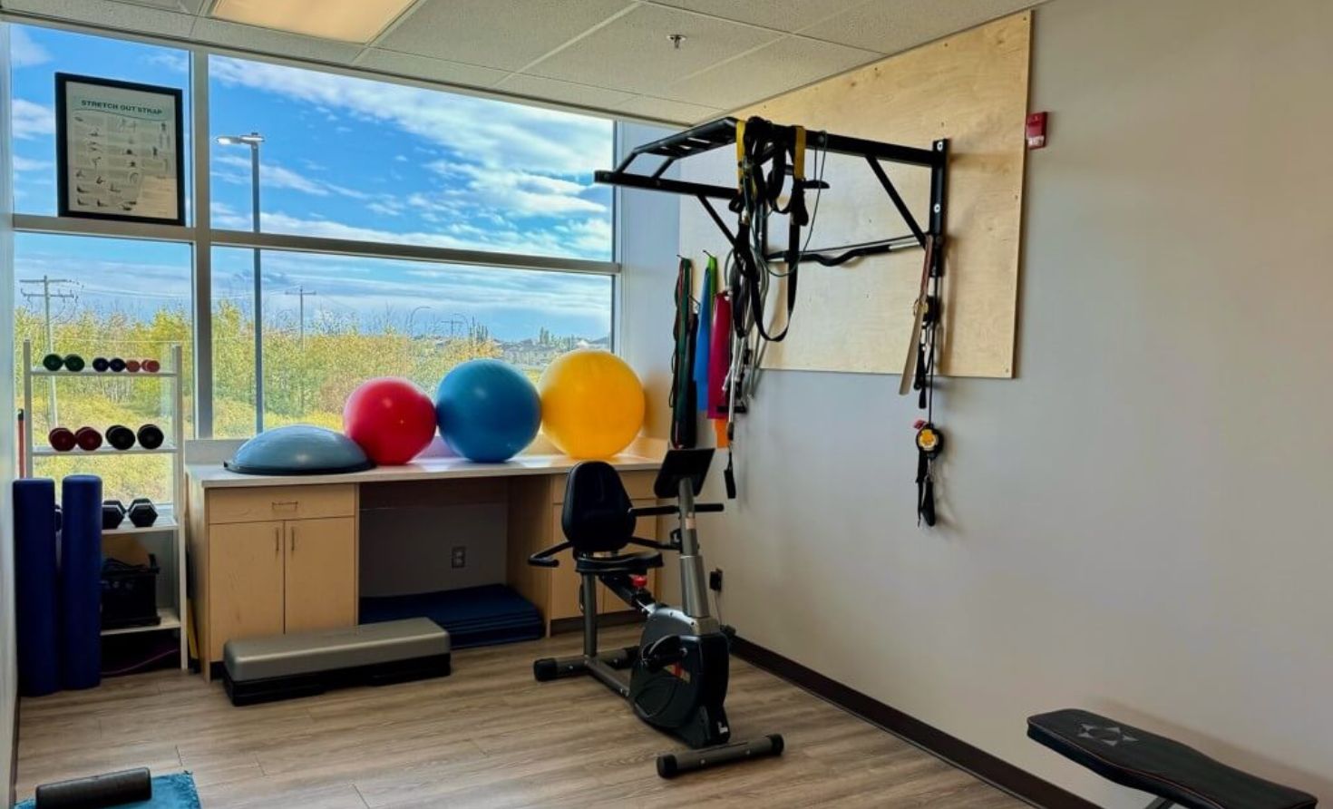 Rehabilitation gym at Incline Physio with exercise equipment and natural light